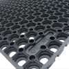 Black rubber grass mat with open-cell design
