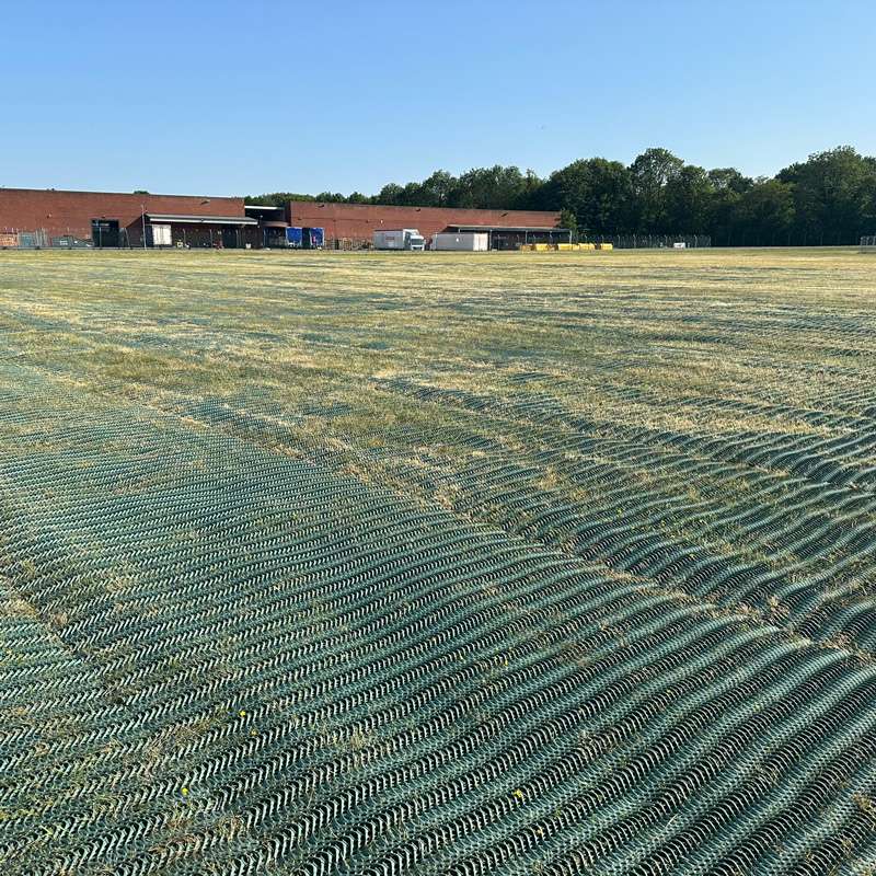 Reinforced parking area showing contrast between treated and untreated grass surfaces.