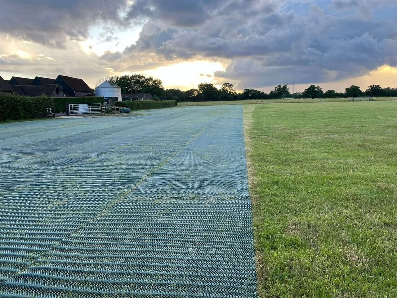 Large grass overflow parking area reinforced with heavy mesh at Battlers Green Farm