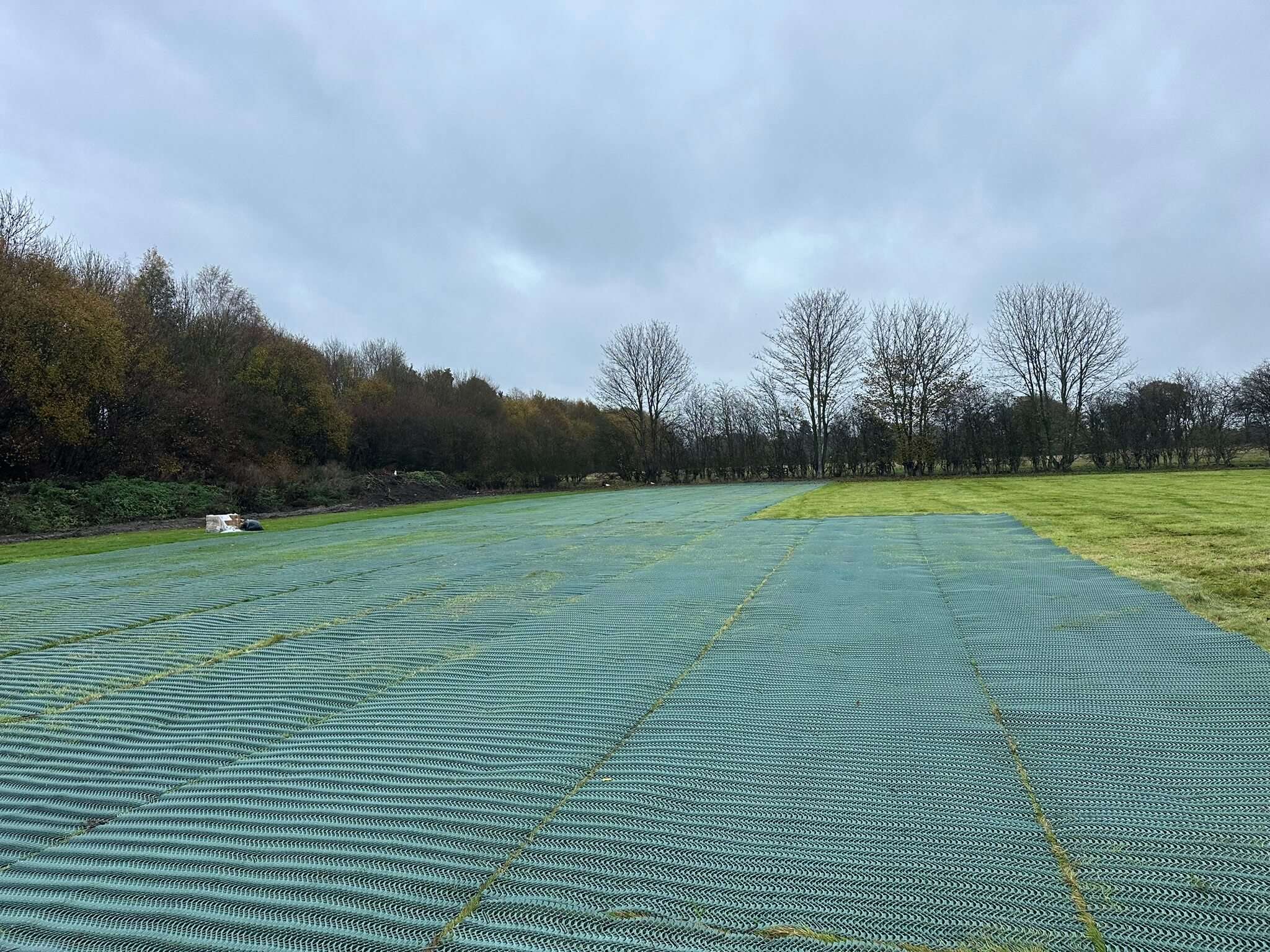 Part-completed heavy grass reinforcement mesh installation at Designer Outlet York