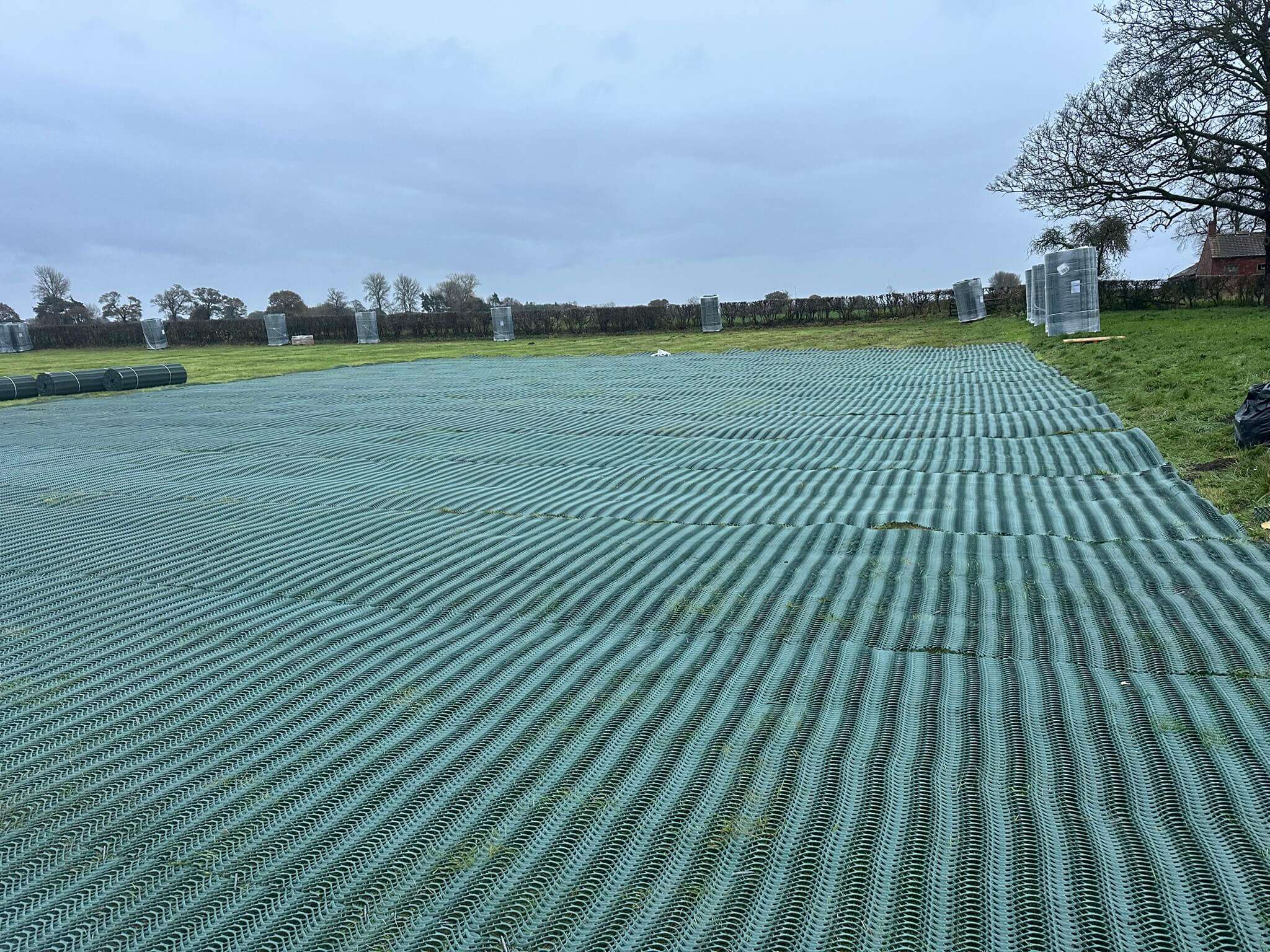 Large grass reinforcement mesh installation for overflow parking at Designer Outlet York