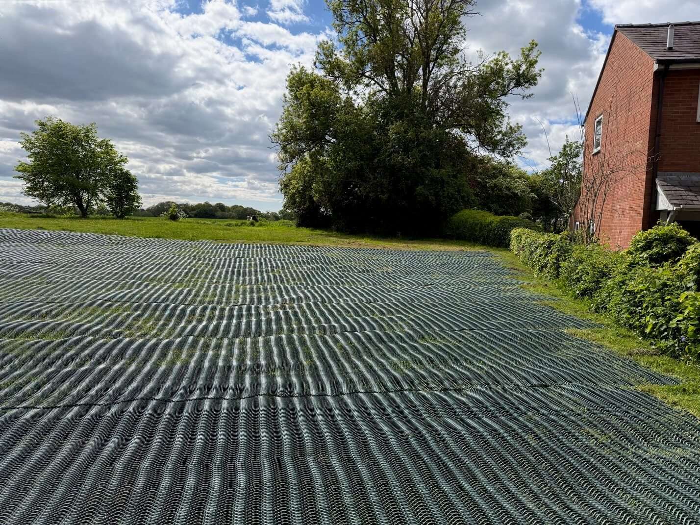 Reinforced grass parking area using heavy grass mesh at Glazebury Methodist Church