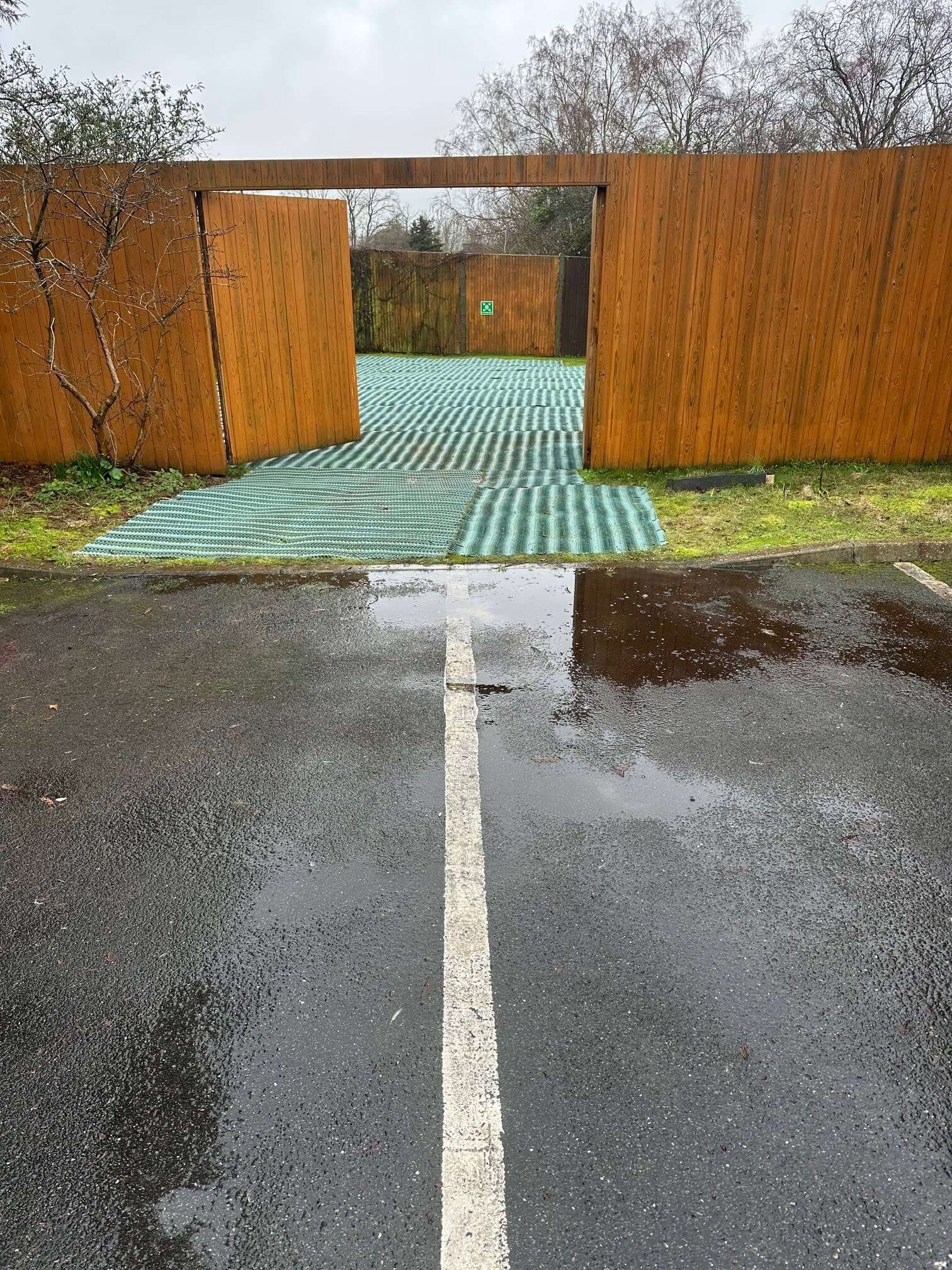 Grass reinforcement mesh installed at the entrance to a church overflow parking area