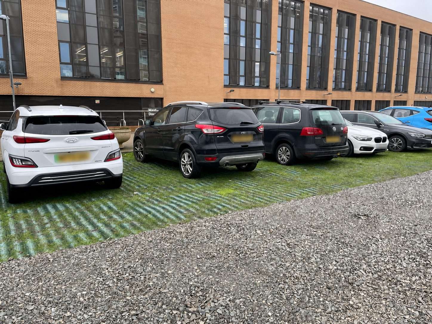 Cars parked on heavy grass reinforcement mesh at Loughborough University