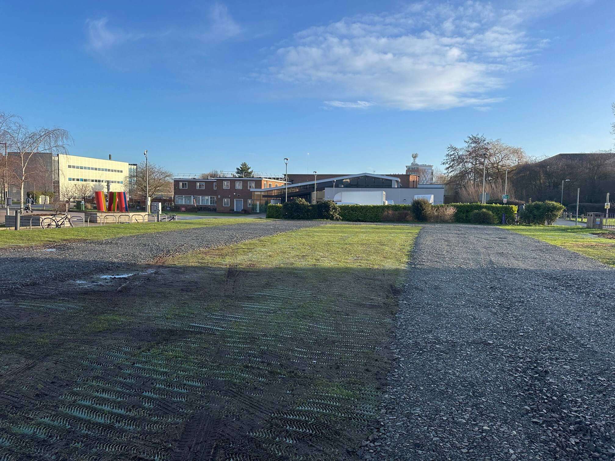 Heavy grass reinforcement mesh installed beside the stone access route at Loughborough University
