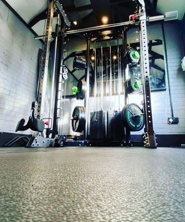 Close-up of installed interlocking Mega Gym Tile surface in a gym